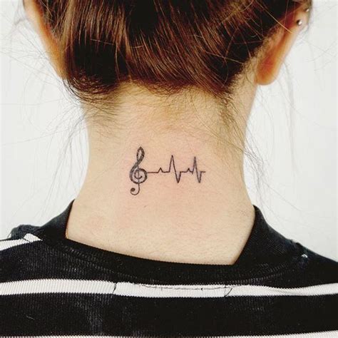 diseños tatuajes de notas musicales